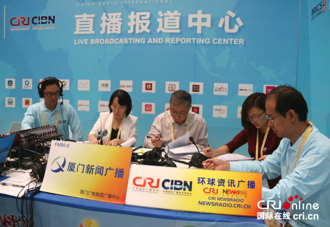 环球资讯广播和厦门新闻广播的联合直播团队。摄影：黎萌