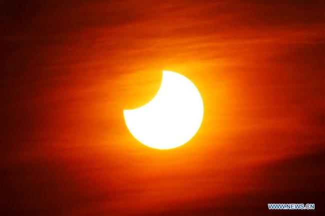 Eclipse solaire partielle observée à Beijing, capitale chinoise, le 6 janvier 2019. (Photo : Wang Junfeng)