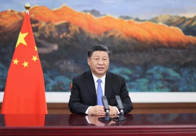 Ο Κινέζος Πρόεδρος Σι Τζινπίγνκ κατά την διάρκεια ομιλίας μέσω βίντεο στην τελετή έναρξης της 3ης Διεθνούς Έκθεσης Εισαγωγών της Κίνας που πραγματοποιήθηκε στη Σαγκάη της ανατολικής Κίνας στις 4 Νοεμβρίου 2020. (Φωτογραφία / Xinhua)