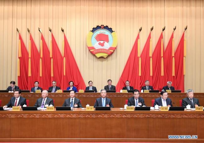 Ο Γουάνγκ Γιανγκ, μέλος της Μόνιμης Επιτροπής του Πολιτικού Γραφείου της Κεντρικής Επιτροπής του Κομμουνιστικού Κόμματος της Κίνας και πρόεδρος της Εθνικής Επιτροπής της Λαϊκής Πολιτικής Συμβουλευτικής Διάσκεψης της Κίνας (CPPCC), παρευρίσκεται στην εναρκτήρια συνεδρίαση της 15ης συνόδου της Μόνιμης Επιτροπής της 13ης Εθνικής Επιτροπής της CPPCC στο Πεκίνο, πρωτεύουσα της Κίνας, 1 Μαρτίου 2021. (φωτογραφία / Xinhua)