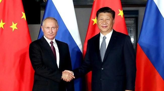 Си Цзиньпин поздравил Владимира Путина с переизбранием на пост президента РФ
