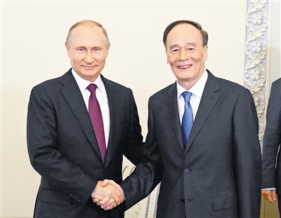 Президент РФ В. Путин встретился с заместителем председателя КНР Ван Цишанем