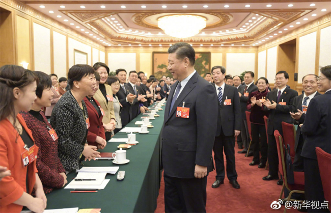 Си Цзиньпин поздравил женщин с Международным женским днем