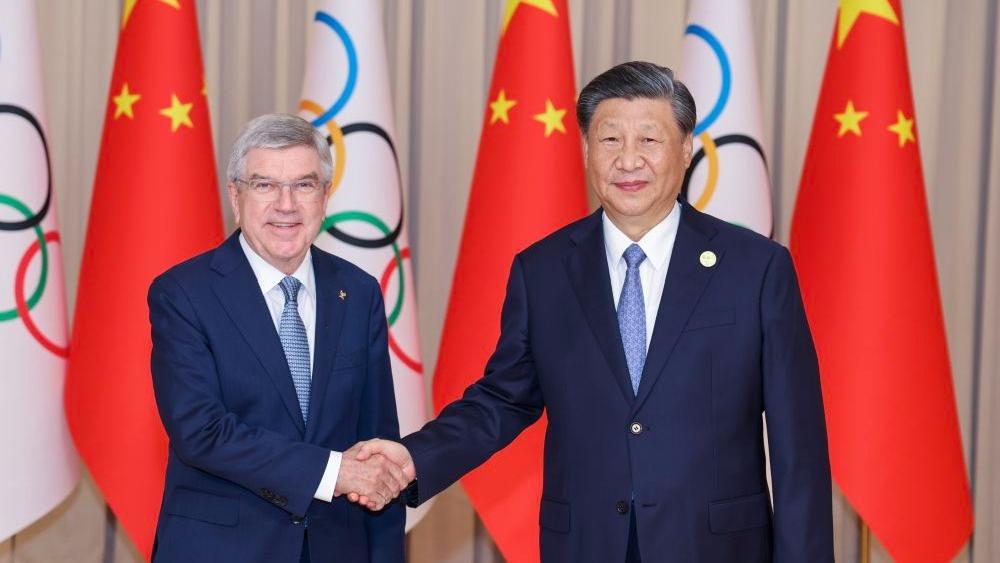 Xi Jinping kommt mit IOC-Präsident Thomas Bach zusammen