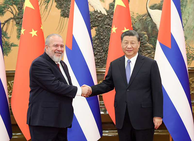 Der kubanischen Premierminister Manuel Marrero Cruz (l.) und der chinesische Staatspräsident Xi Jinping | Bildquelle: CRI Onluine © Na | Bilder sind in der Regel urheberrechtlich geschützt