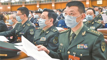 Wakilan jama’a daga rundunar sojin PLA ke nan da suka halarci taron shekara-shekara na NPC